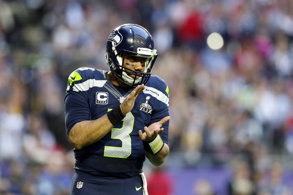 Seattle Seahawks' Carlos Dunlap on Russell Wilson: 'He told me he's with us  and he's here to stay' 