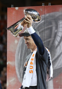 Feb 7, 2016; Santa Clara, CA, USA; Denver Broncos quarterback Peyton Manning (18) hoists the Vince Lombardi Trophy after beat the Carolina Panthers in Super Bowl 50 at Levi's Stadium. Mandatory Credit: Matthew Emmons-USA TODAY Sports