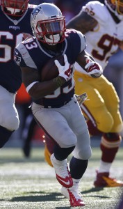 Nov 8, 2015; Foxborough, MA, USA; New England Patriots running back Dion Lewis (33) carries the ball during the first quarter against the Washington Redskins at Gillette Stadium. Mandatory Credit: Greg M. Cooper-USA TODAY Sports