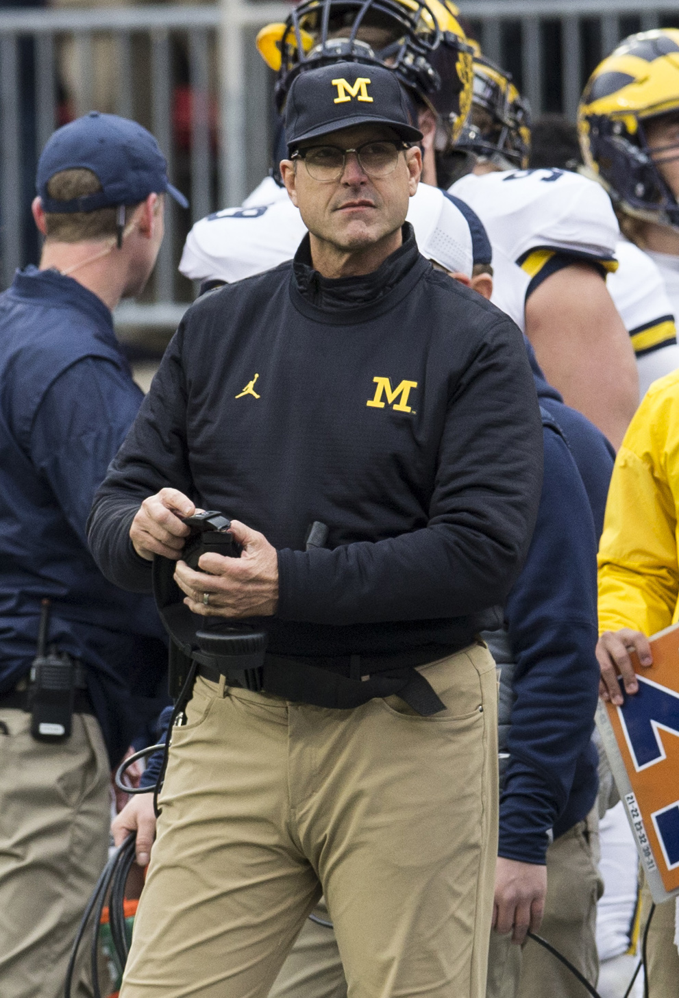 Jim Harbaugh takes on Comerica Park, khakis and all