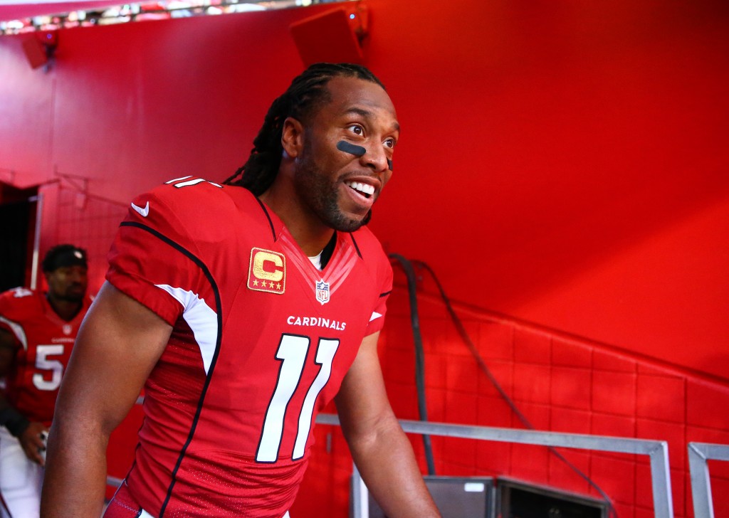 Arizona Cardinals wide receiver Larry Fitzgerald outruns