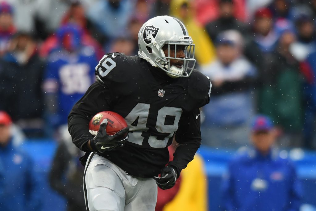 Oakland Raiders fullback Jamize Olawale (49) is congratulated by