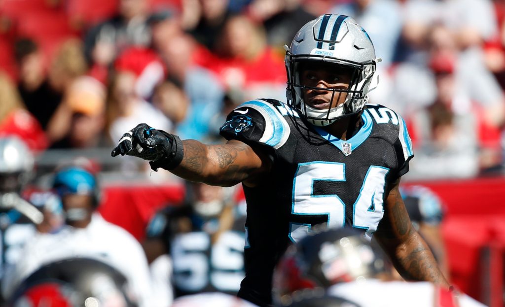 Panthers improve cap space by restructuring Moton's contract