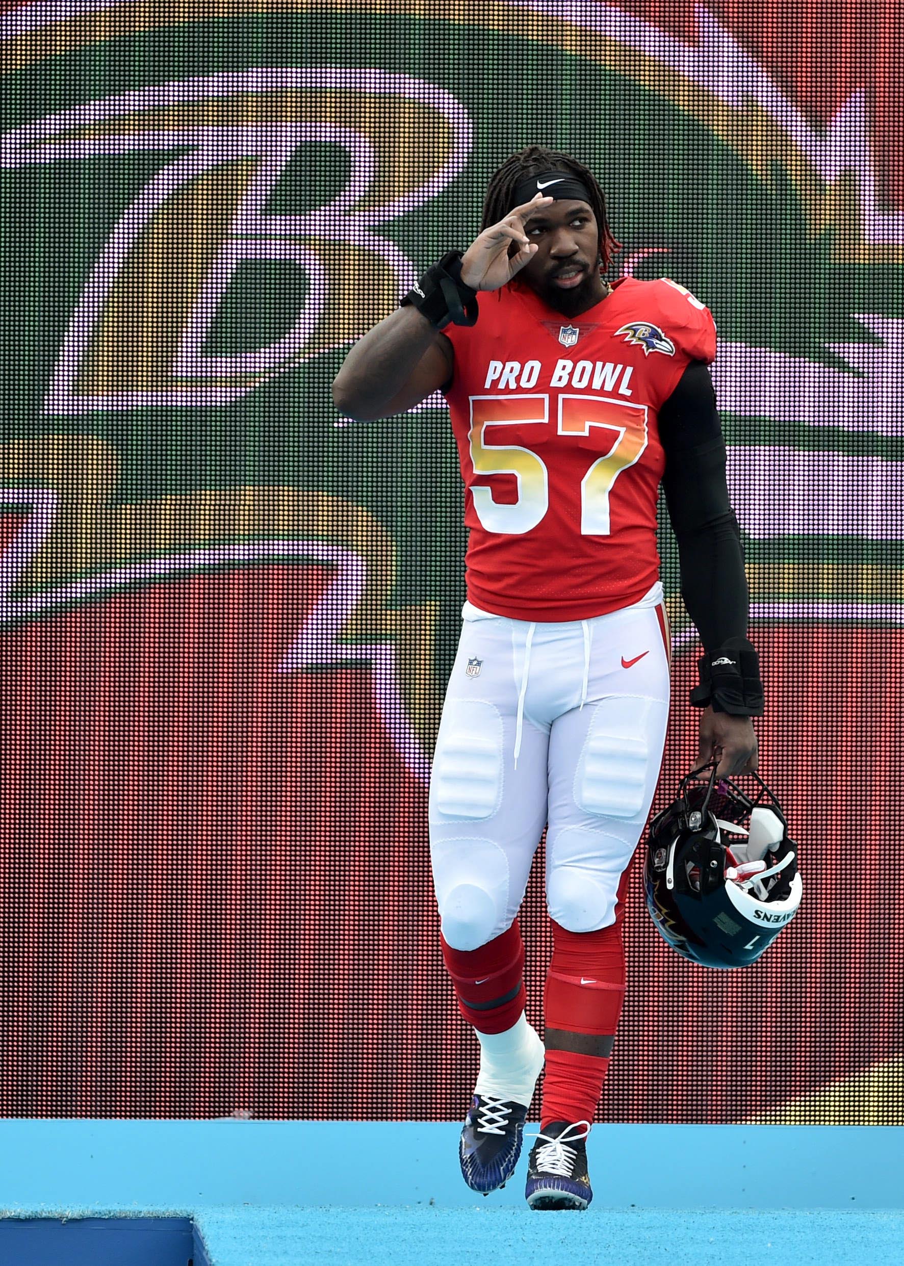 New York Jets linebacker C.J. Mosley (57) looks out before the