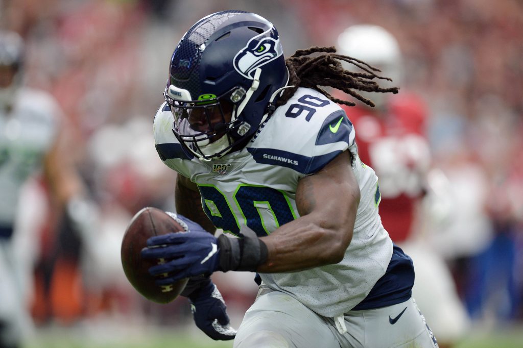 Seahawks DT Jarran Reed sold No. 90 to Jadeveon Clowney, then took it back  for free a year later