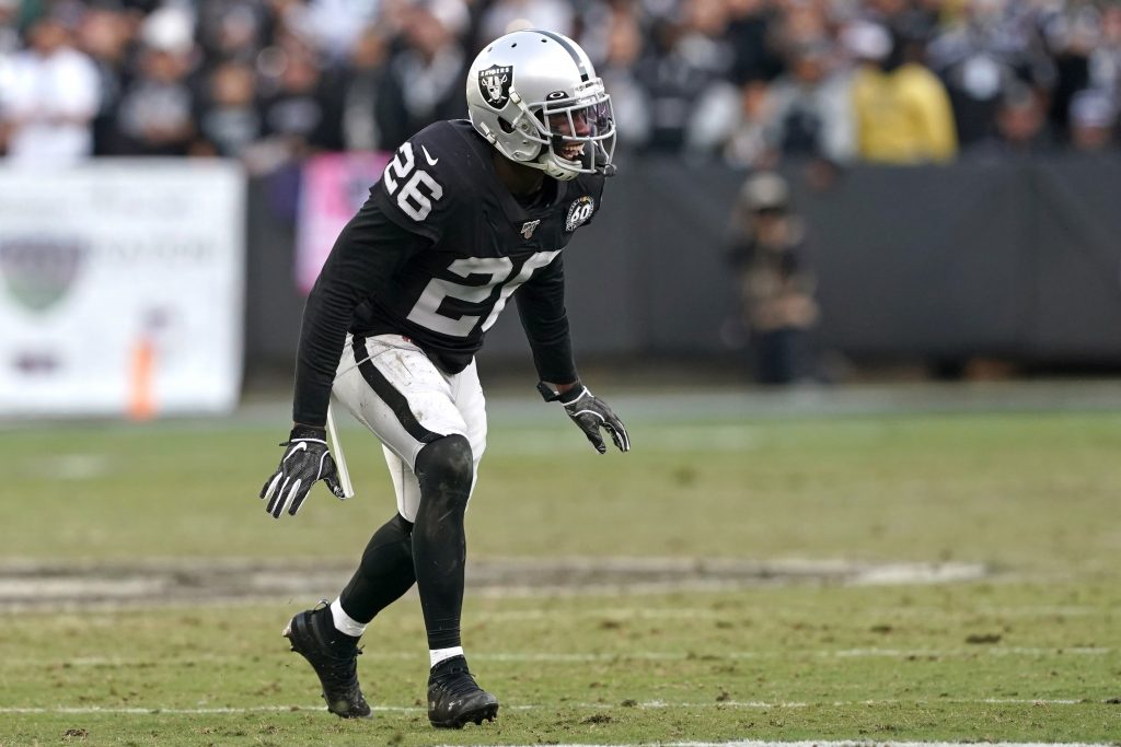 Oakland Raiders cornerback Nevin Lawson (26) returns a kickoff during the  first half of an NFL …