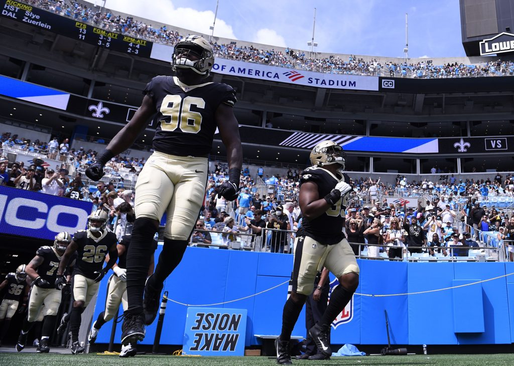 New Orleans Saints defensive end Carl Granderson signs a four-year