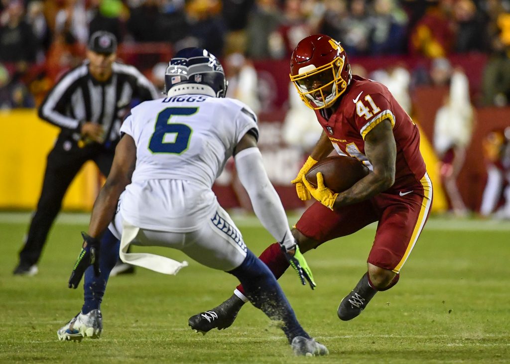 Washington's J.D. McKissic Superman dives into the end zone for