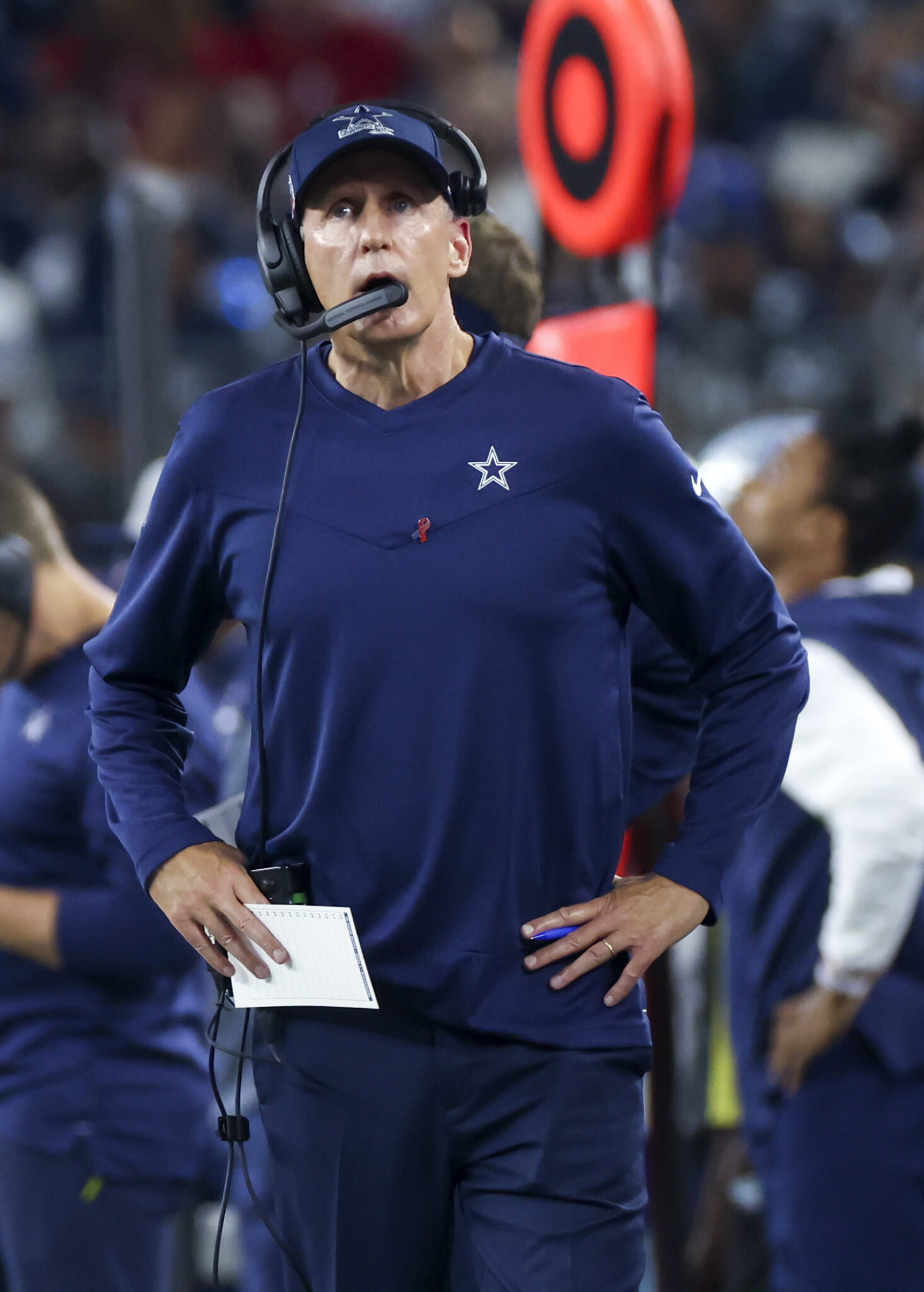 Dallas Cowboys coach on the sidelines