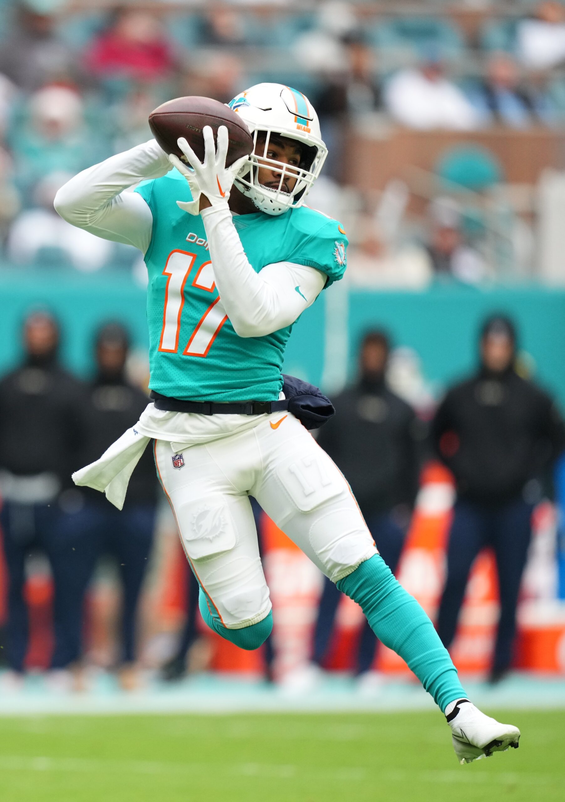 Miami Dolphins wide receiver Jaylen Waddle (17) runs a play during